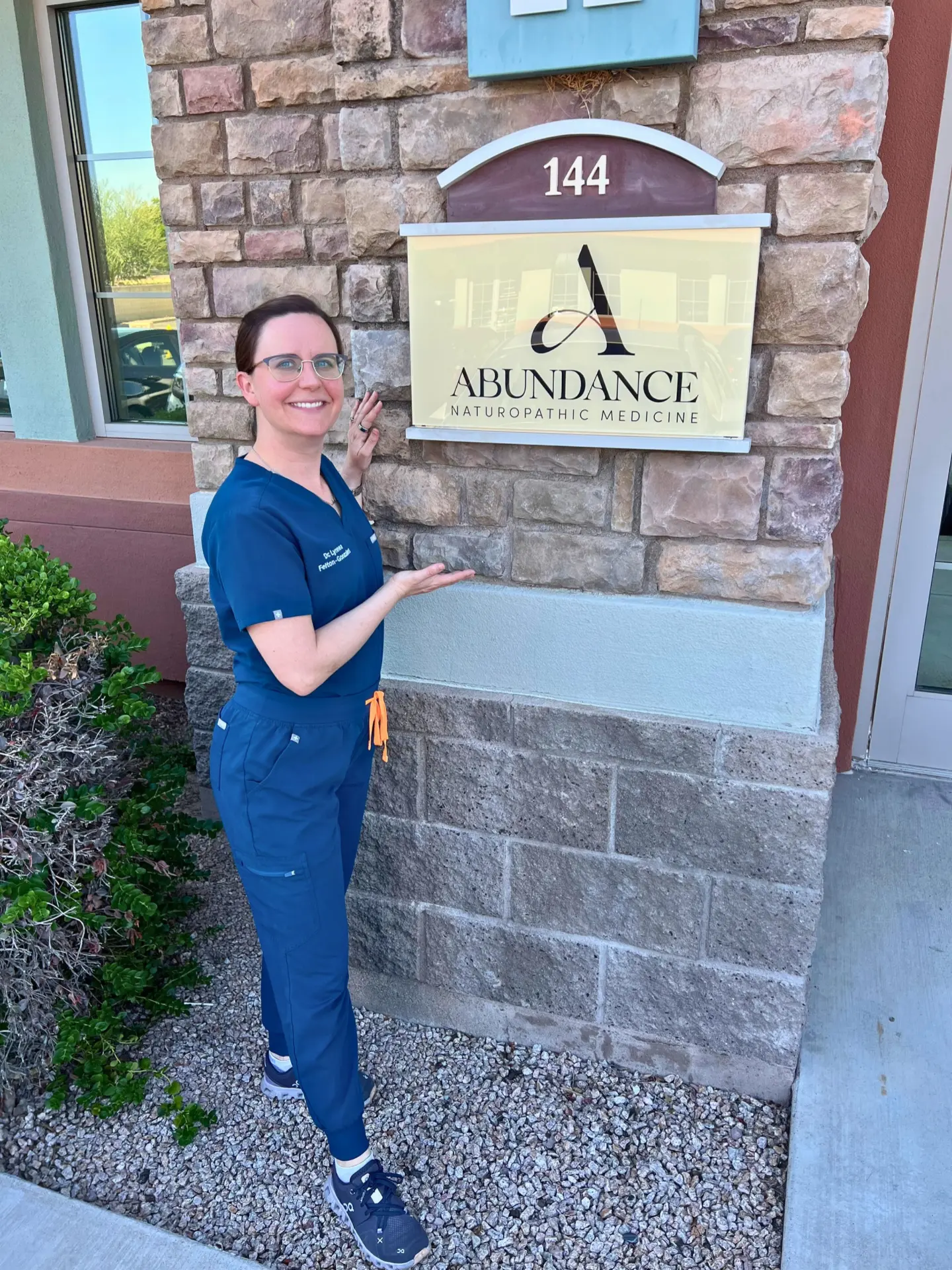 Abundance Naturopathic Medicine clinic sign, Suite 144