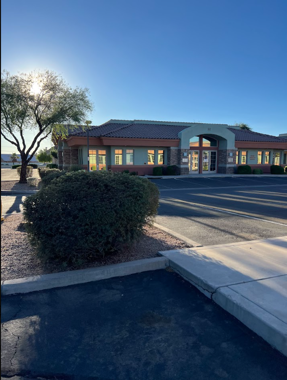The Abundance clinic building exterior at sunrise